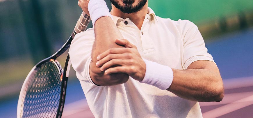 patient needing tennis elbow treatment in San Clemente CA